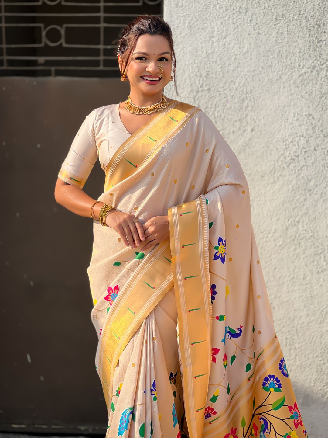 bridal white paithani saree with traditional muniya border