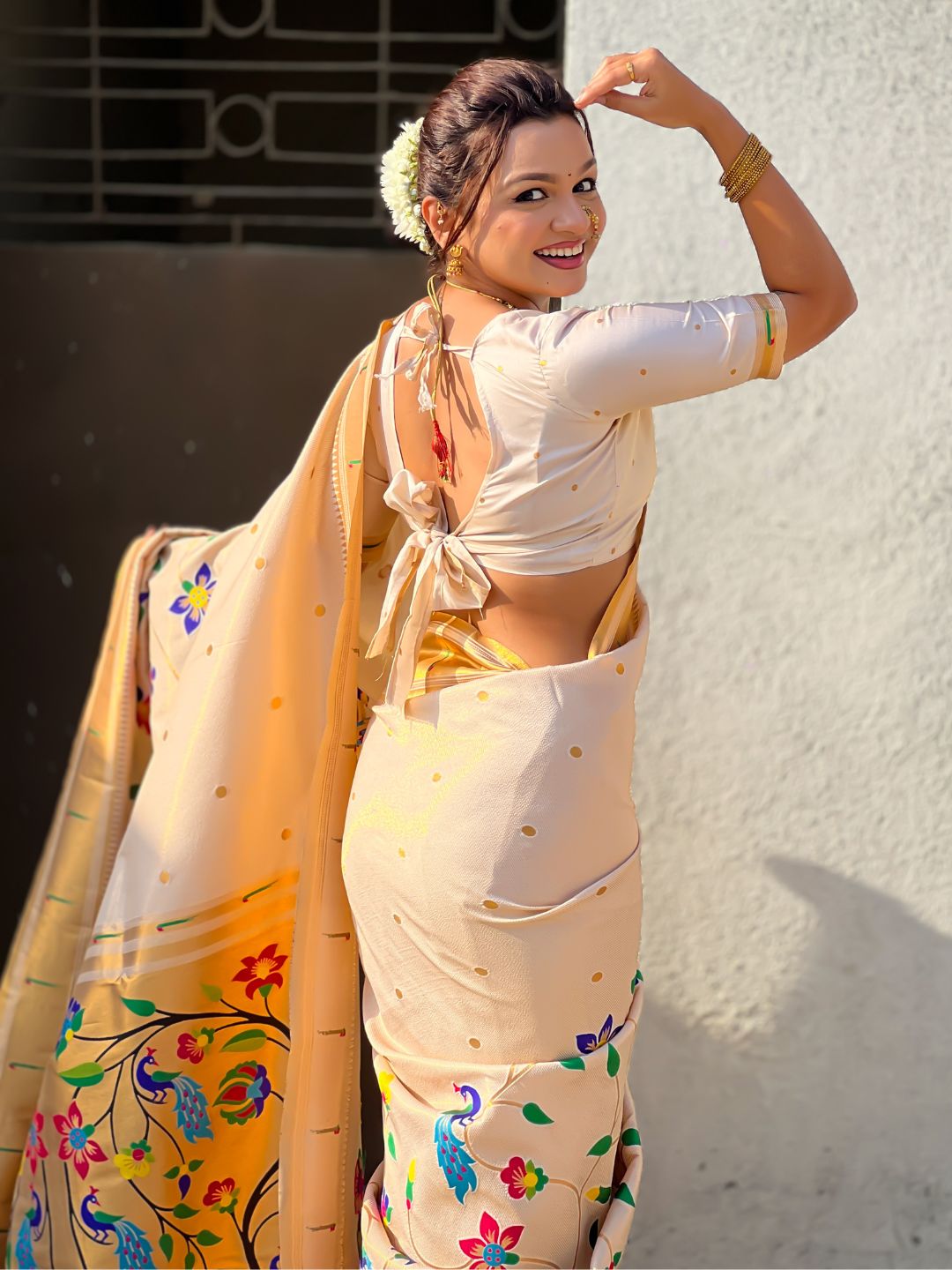 elegant white wedding saree with heritage paithani craftsmanship