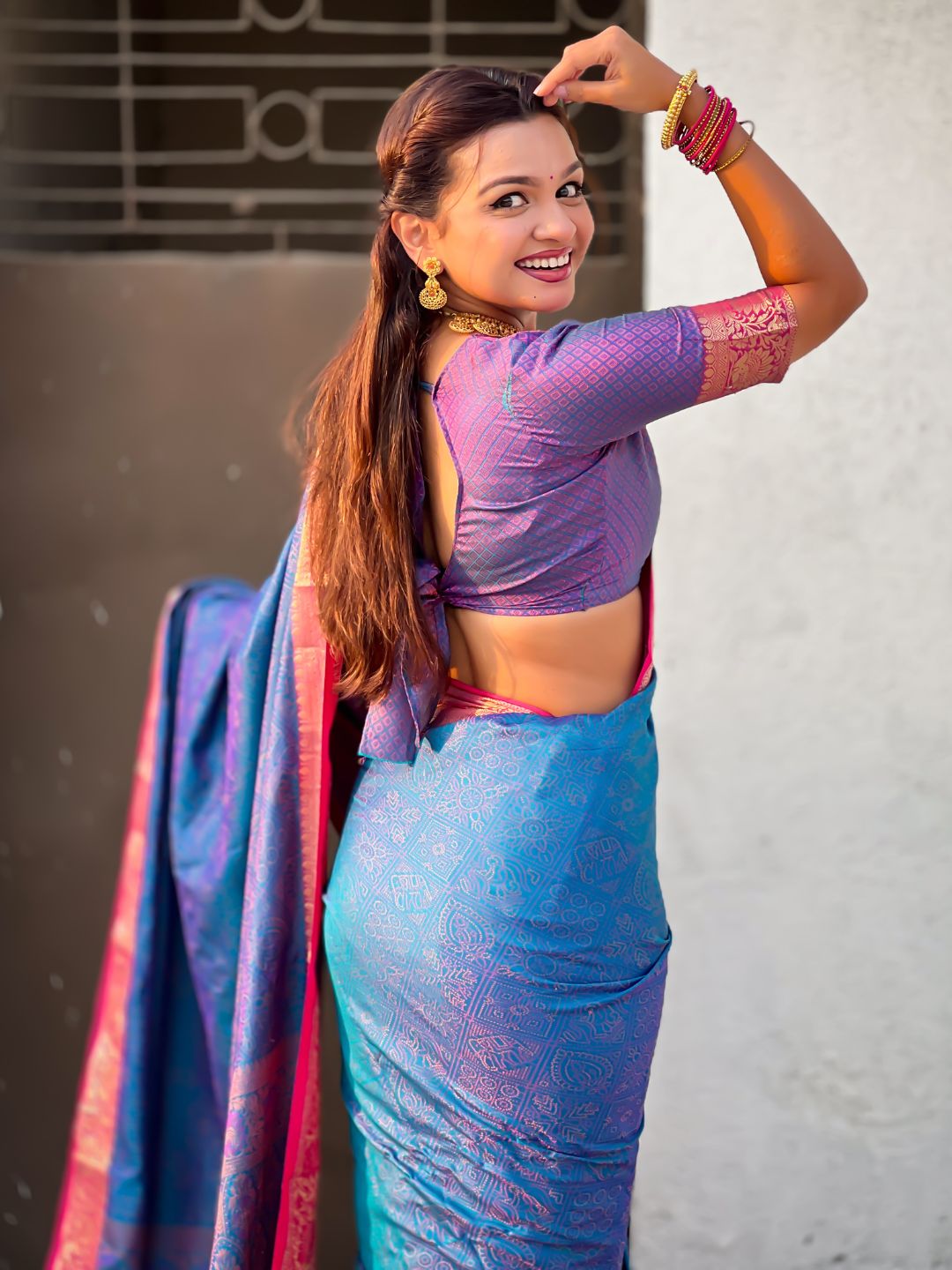 festive blue silk saree with intricate bandhani weaving design
