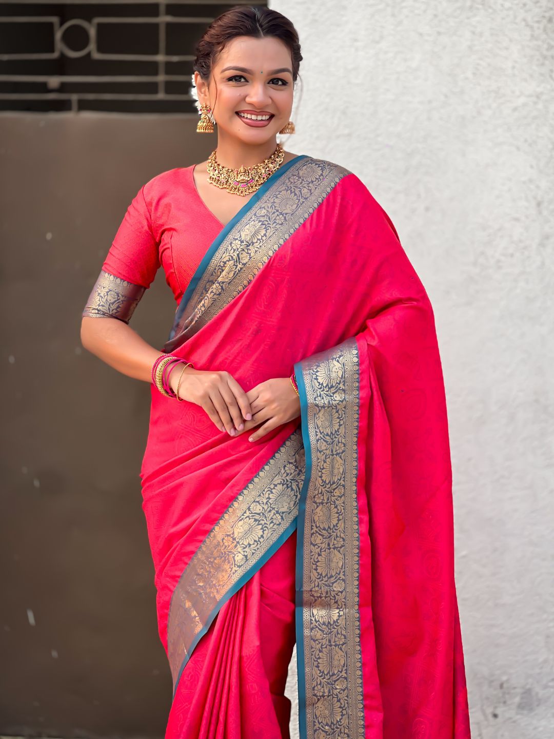 elegant light pink silk saree with rich zari woven floral border