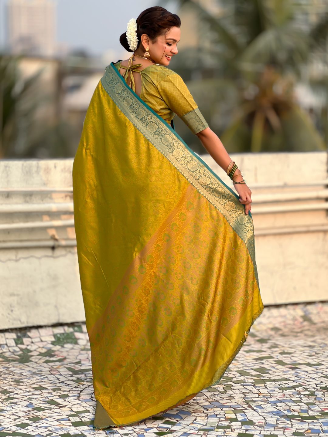 wedding wear mehendi green saree with graceful soft silk drape