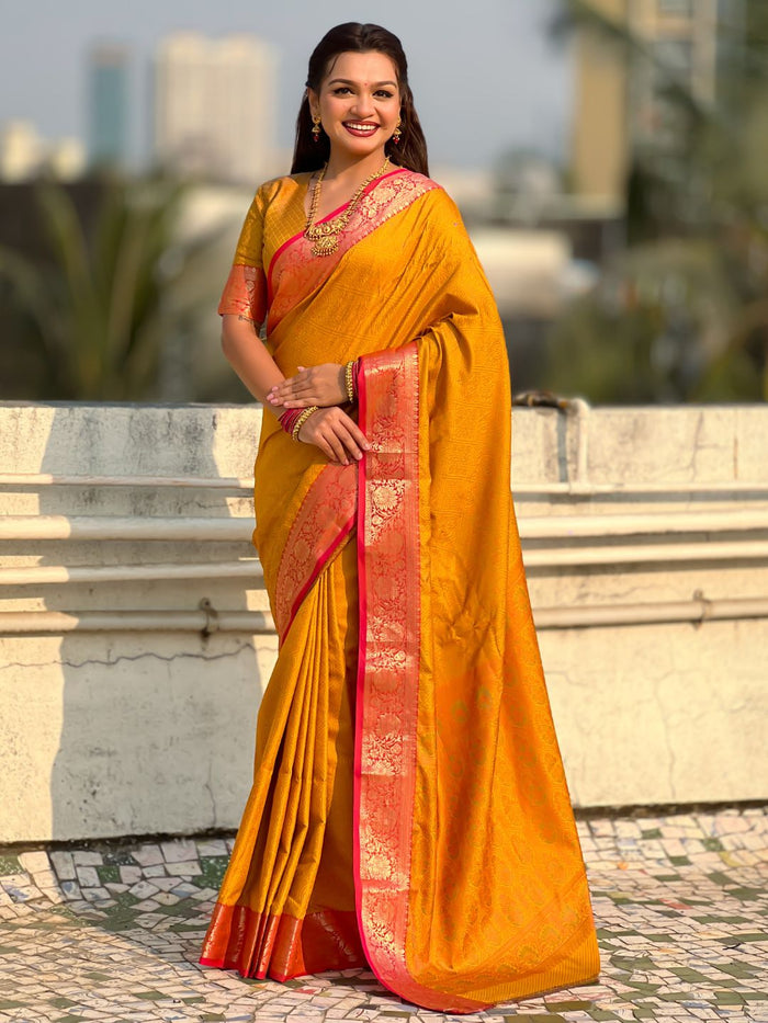 yellow soft patola silk saree with bandhani weaving for haldi function