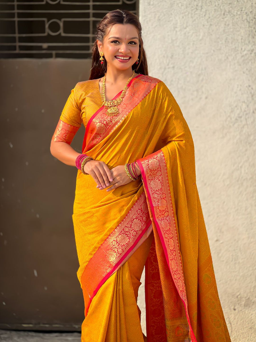 special haldi wear yellow saree with rich zari woven floral border