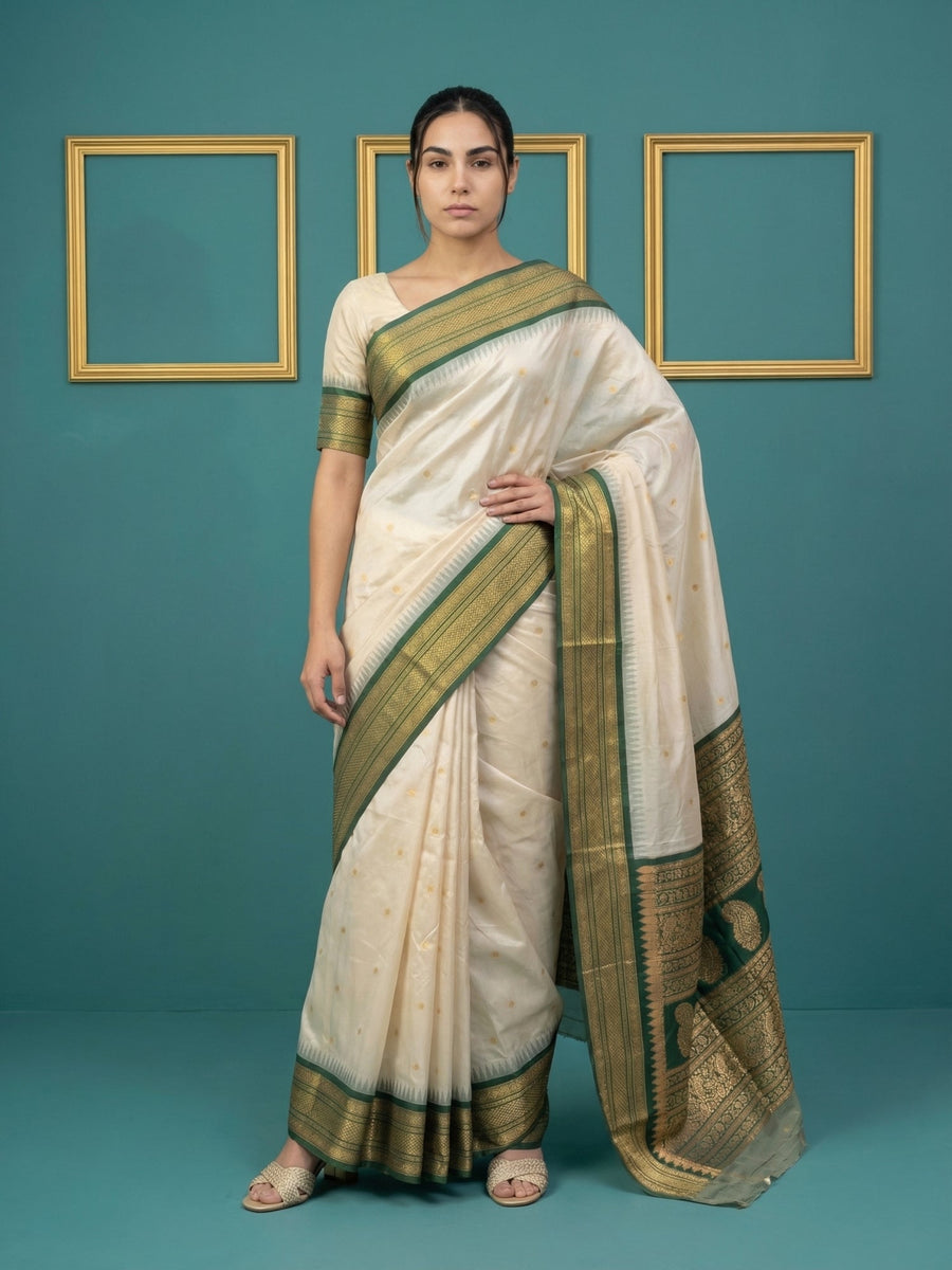 cream soft silk saree with gold zari motifs