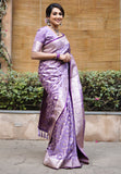 Divya in our Lavender Banarasi Jaal Satin Silk Pink Zari Woven Saree