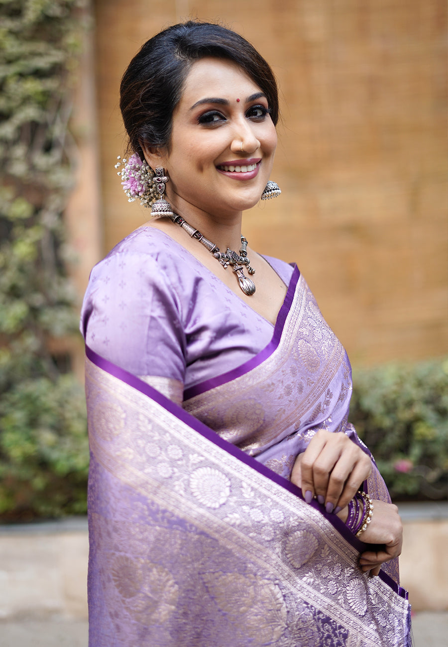 Divya in our Lavender Banarasi Jaal Satin Silk Pink Zari Woven Saree
