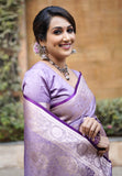 Divya in our Lavender Banarasi Jaal Satin Silk Pink Zari Woven Saree