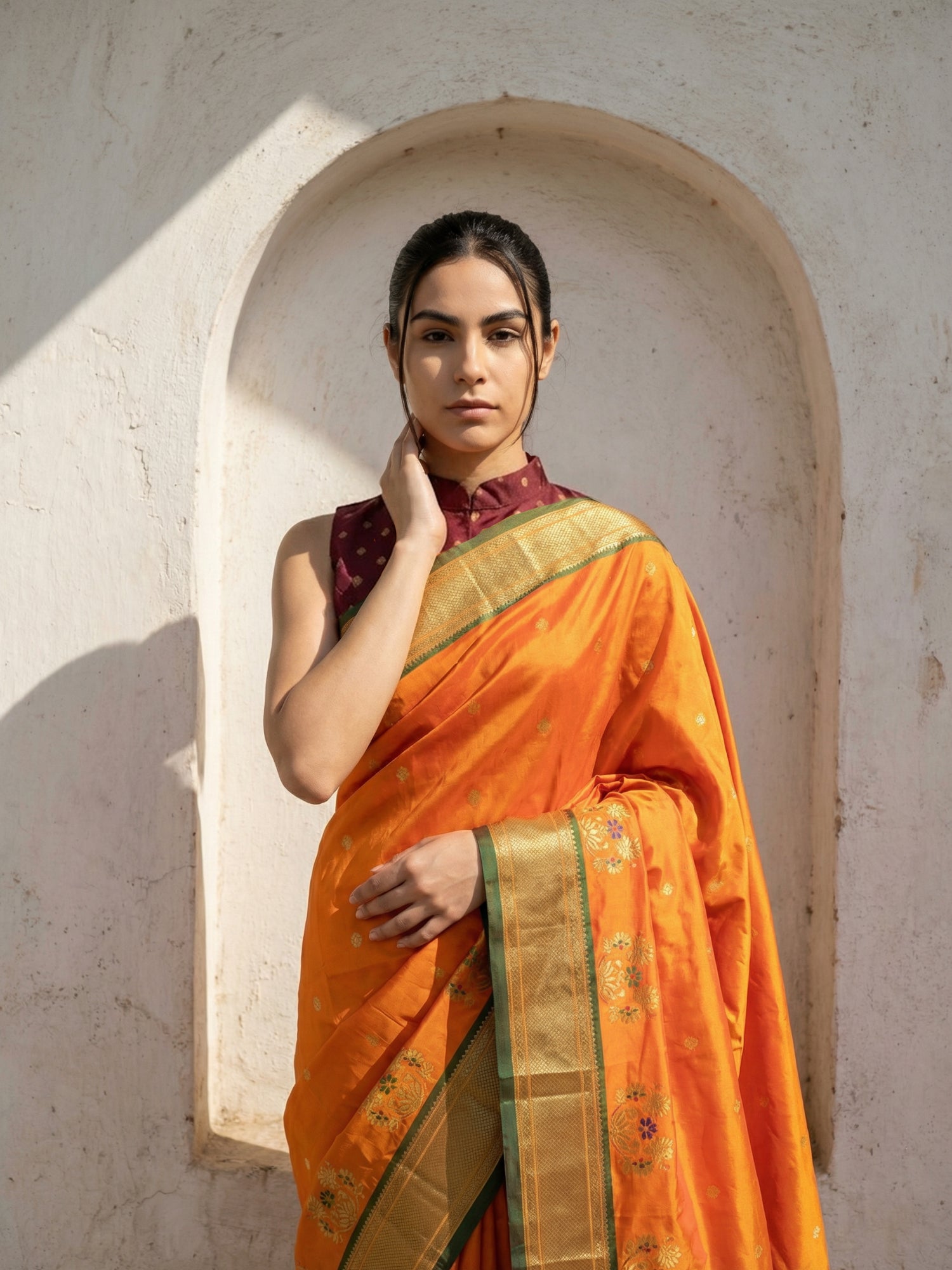 festive orange silk saree with rich woven traditional pallu