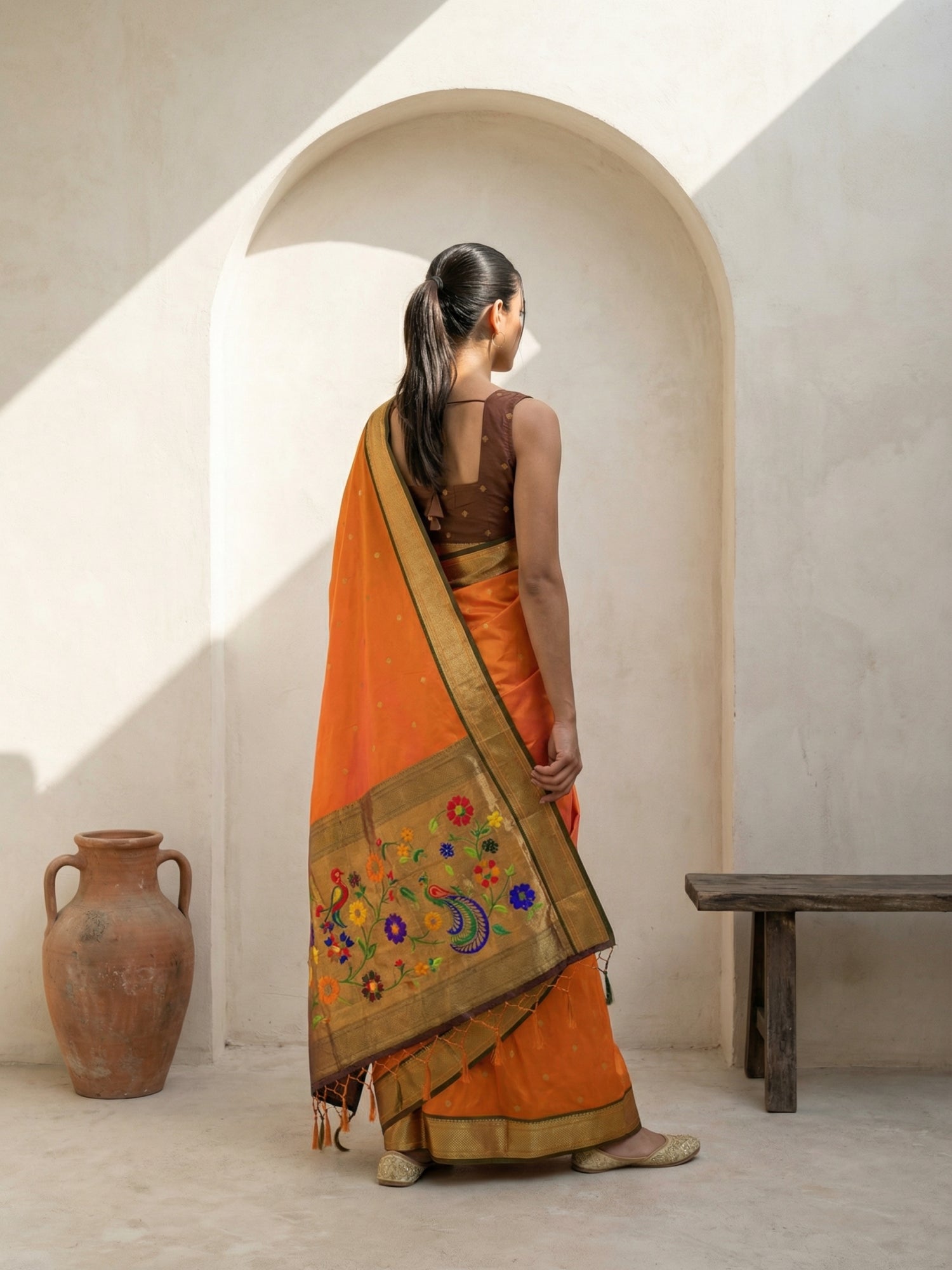 designer orange saree perfect for weddings and celebrations