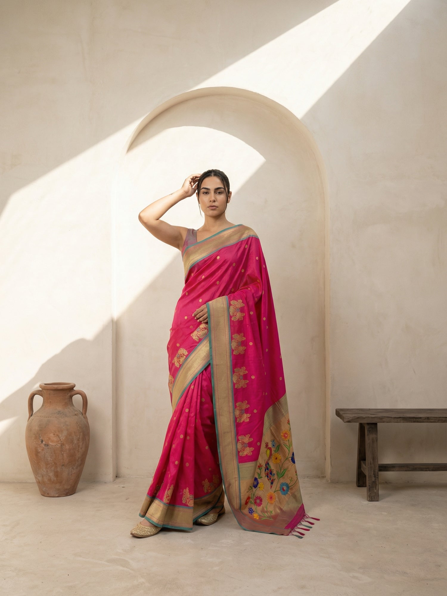 wedding wear pink saree with graceful drape and woven detailing