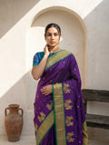 elegant purple paithani saree with contrast peacock panel border