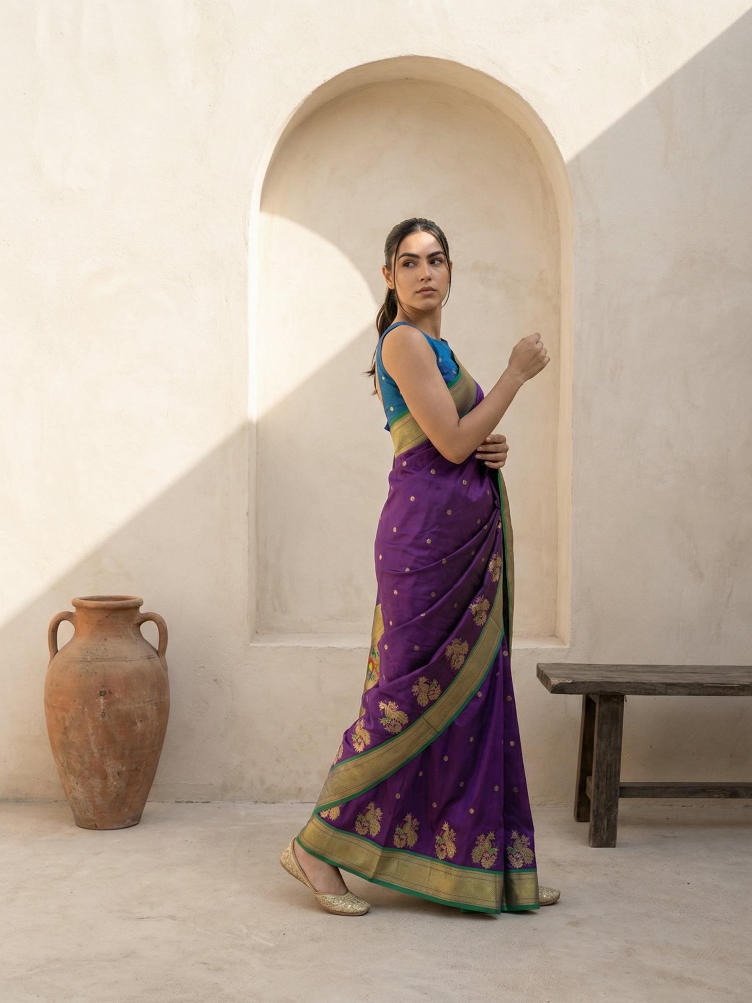 wedding wear purple saree with graceful drape and woven detailing
