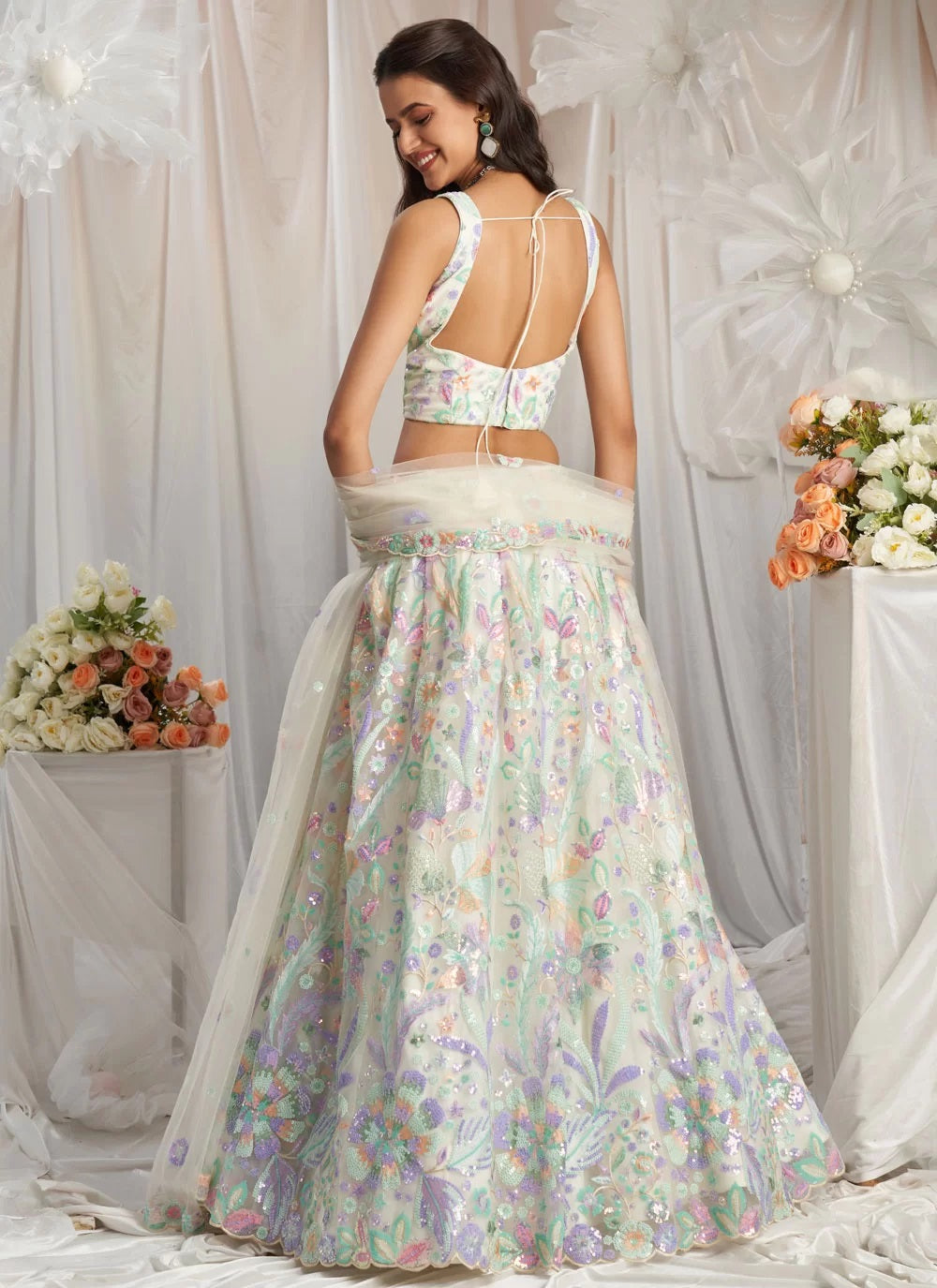 Graceful Cream Net Wedding Lehenga for Bride's Sister