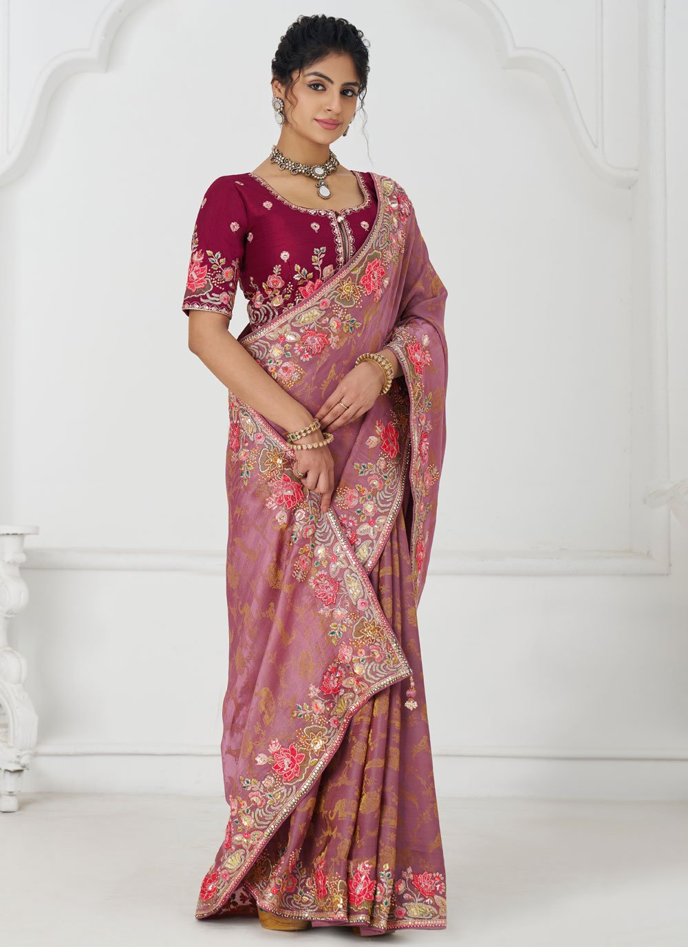 Hand-embroidered beadwork along motifs and borders saree