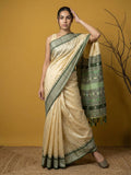 festive bottle green saree with rich zari motif craftsmanship