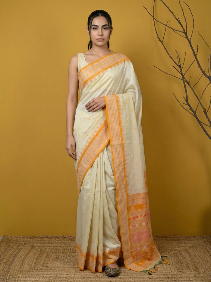 yellow handloom soft silk saree with delicate zari woven motifs