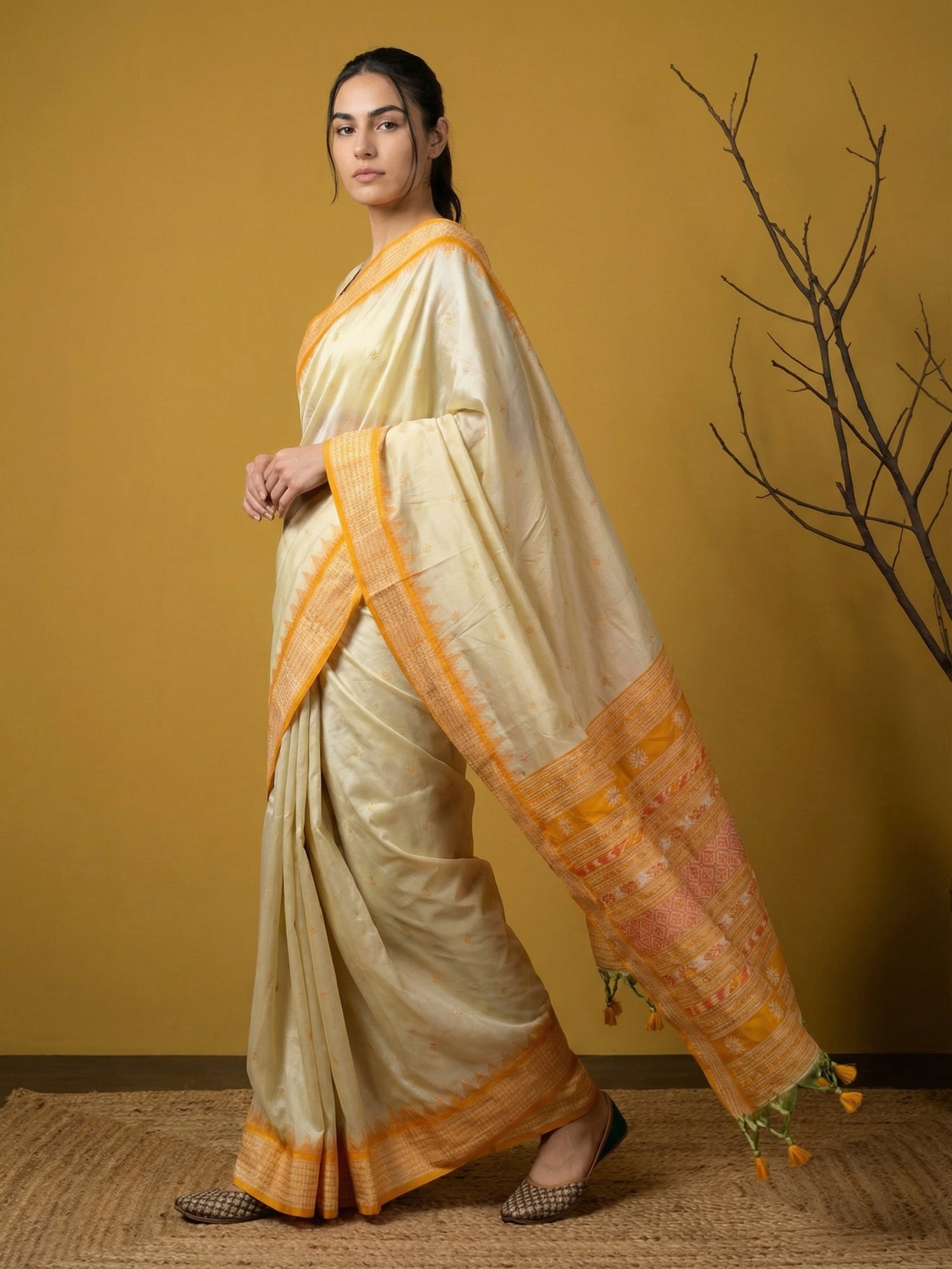 ethnic yellow silk saree with classic zari weaving craftsmanship