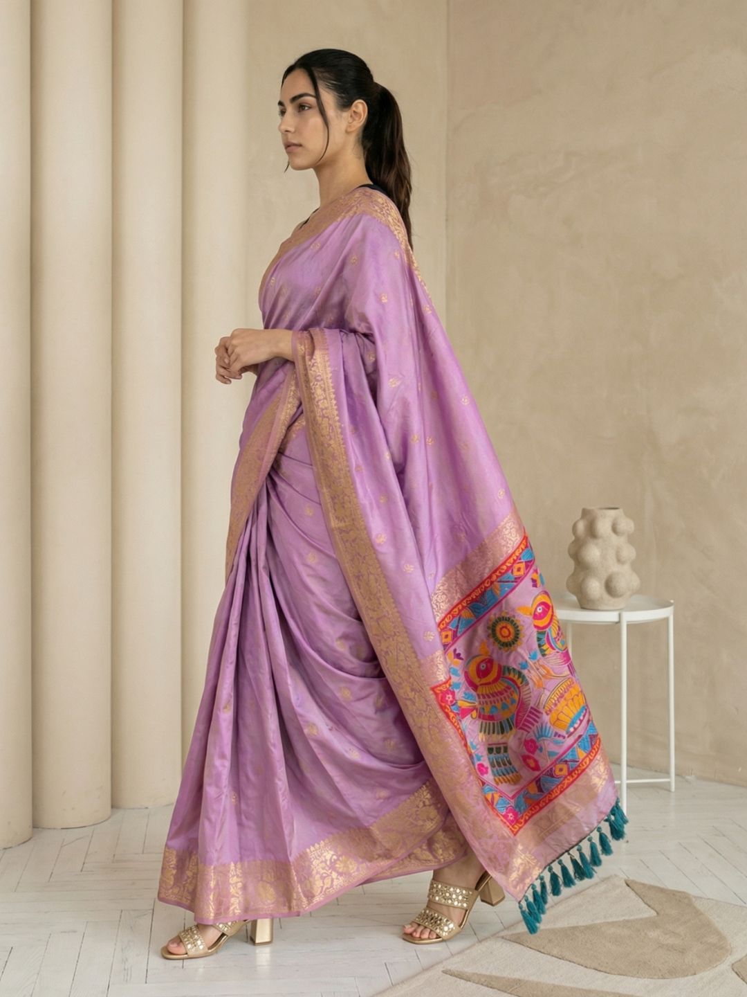 traditional soft silk saree with floral motifs and rich pallu detail