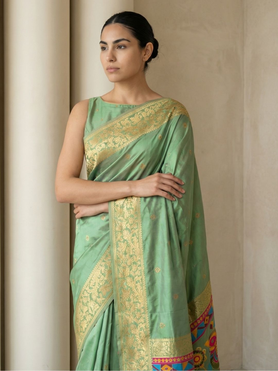 traditional green soft silk saree with floral motifs and rich pallu detail