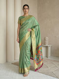 elegant green silk saree featuring sparrow design pallu and woven border