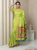 pista green soft silk saree with gold zari floral motifs and contrast meenakari pallu