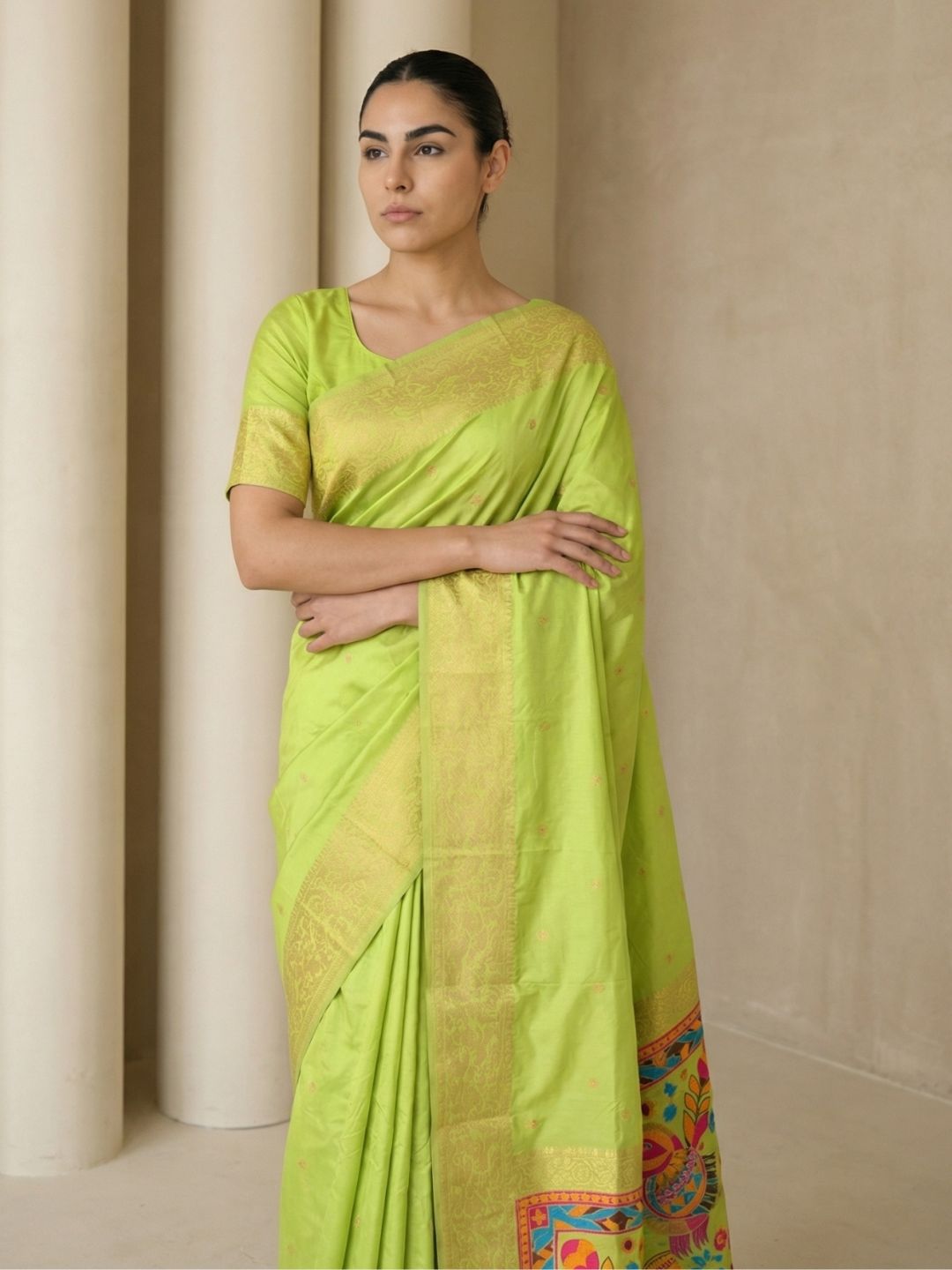 wedding wear pista green saree with floral zari motifs and contrast pallu