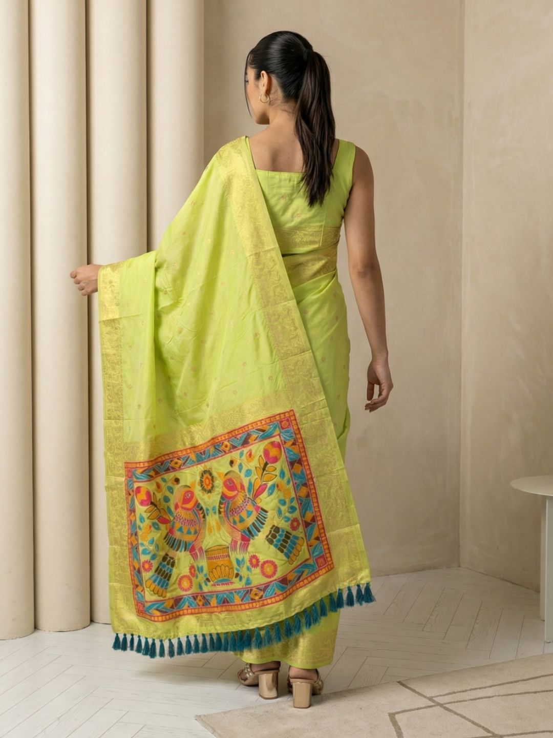 festive pista green saree with zari weaving and smooth elegant drape