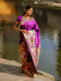 Saloni in our Purple Paithani Silk Saree with Half Half Concept Big Border Zari Woven Saree