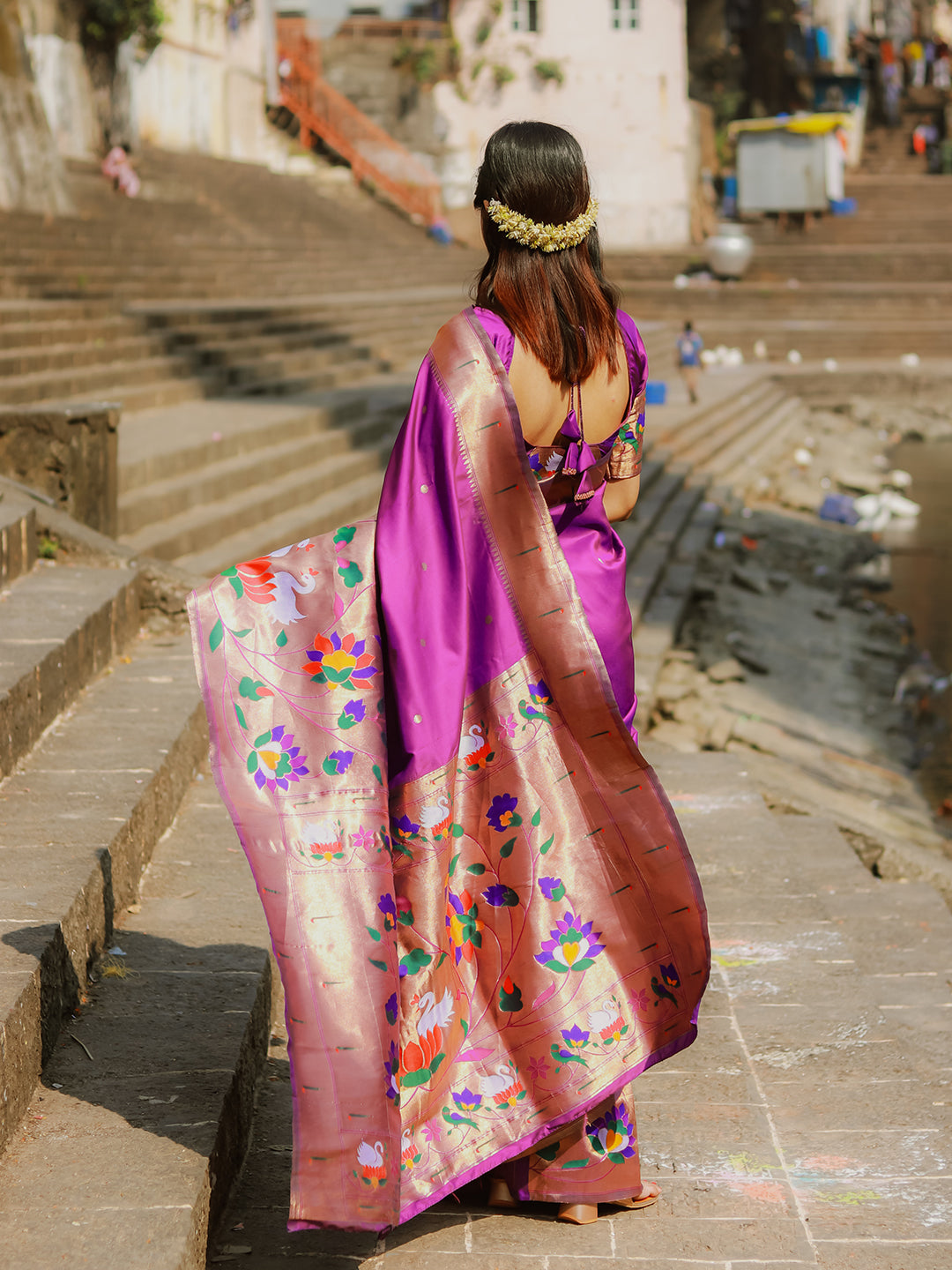 Saloni in our Purple Paithani Silk Saree with Half Half Concept Big Border Zari Woven Saree