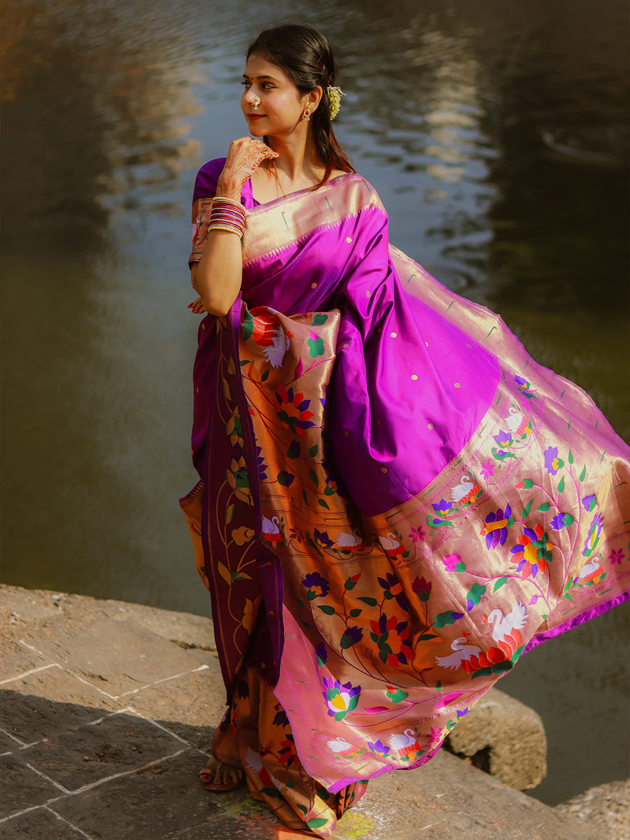 Saloni in our Purple Paithani Silk Saree with Half Half Concept Big Border Zari Woven Saree