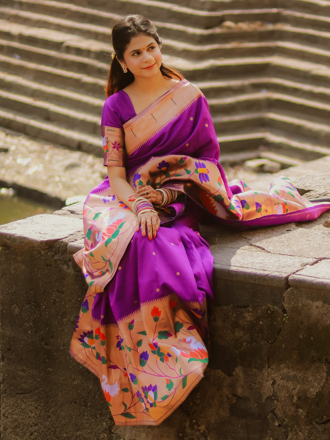 Saloni in our Purple Paithani Silk Saree with Half Half Concept Big Border Zari Woven Saree