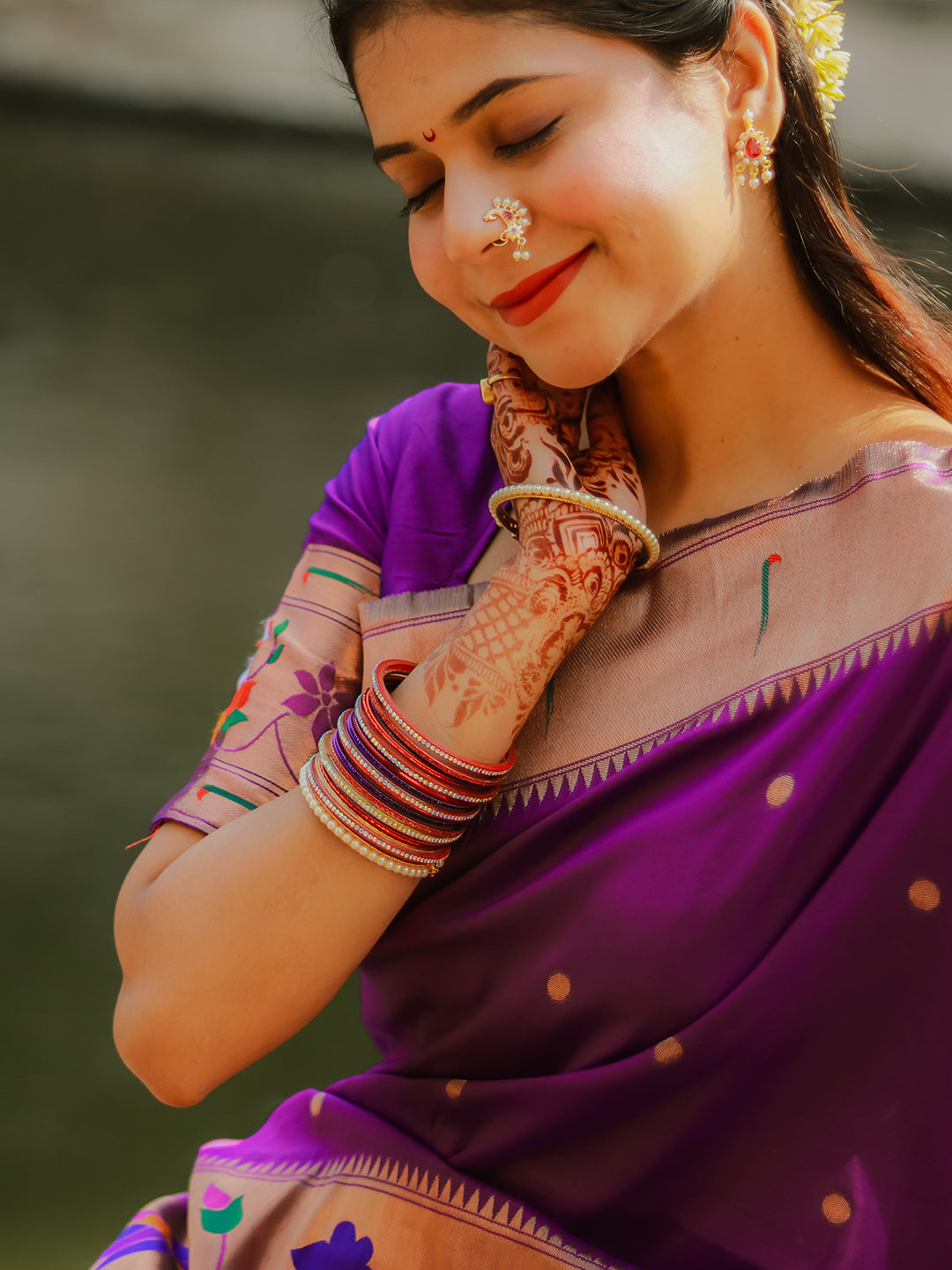 Saloni in our Purple Paithani Silk Saree with Half Half Concept Big Border Zari Woven Saree
