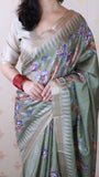 Pista Green Soft Tussar Silk Nature Printed Zari Woven Saree