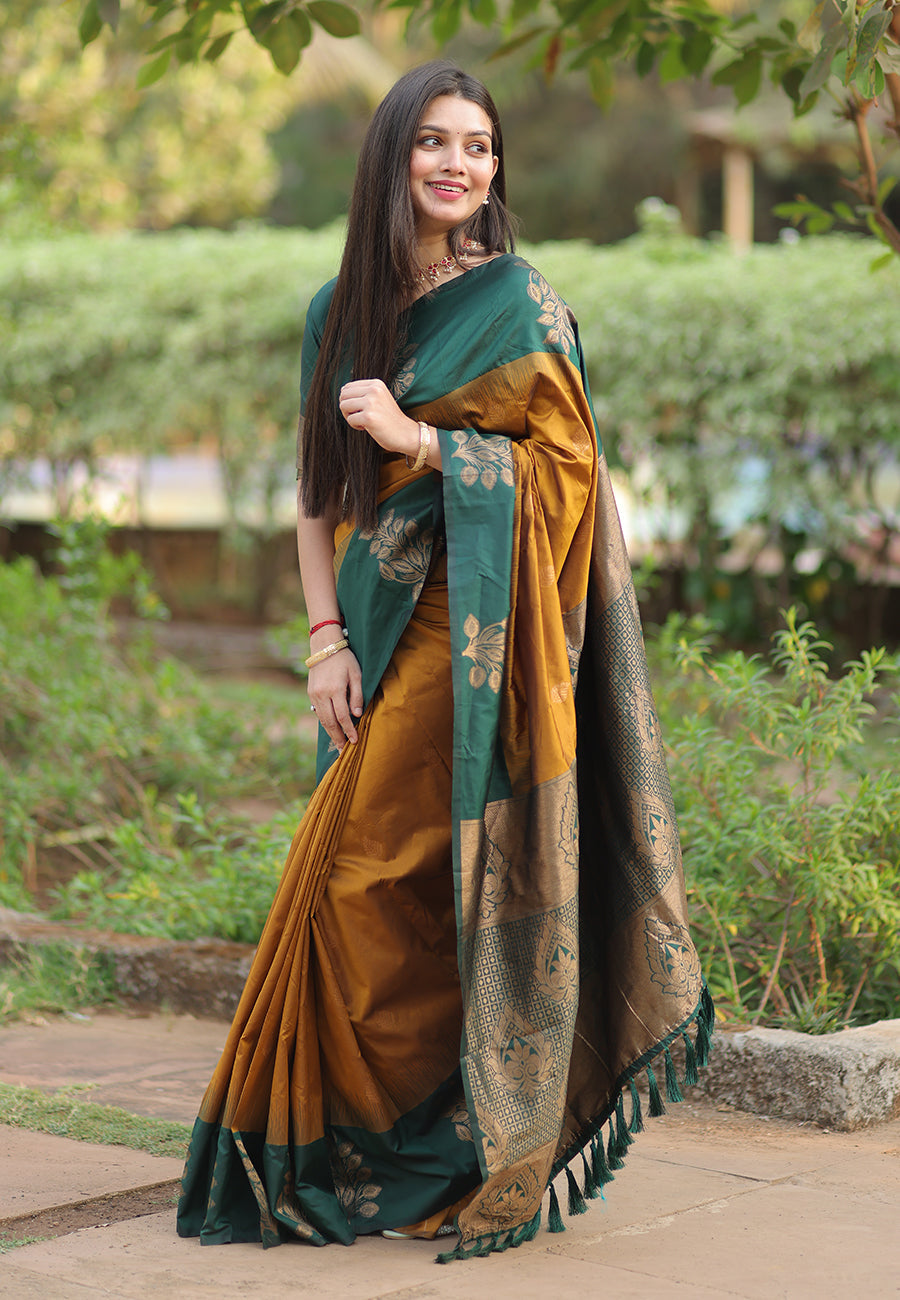 Rashmi in our Gold Soft Silk Floral Border Contrast Zari Woven Saree