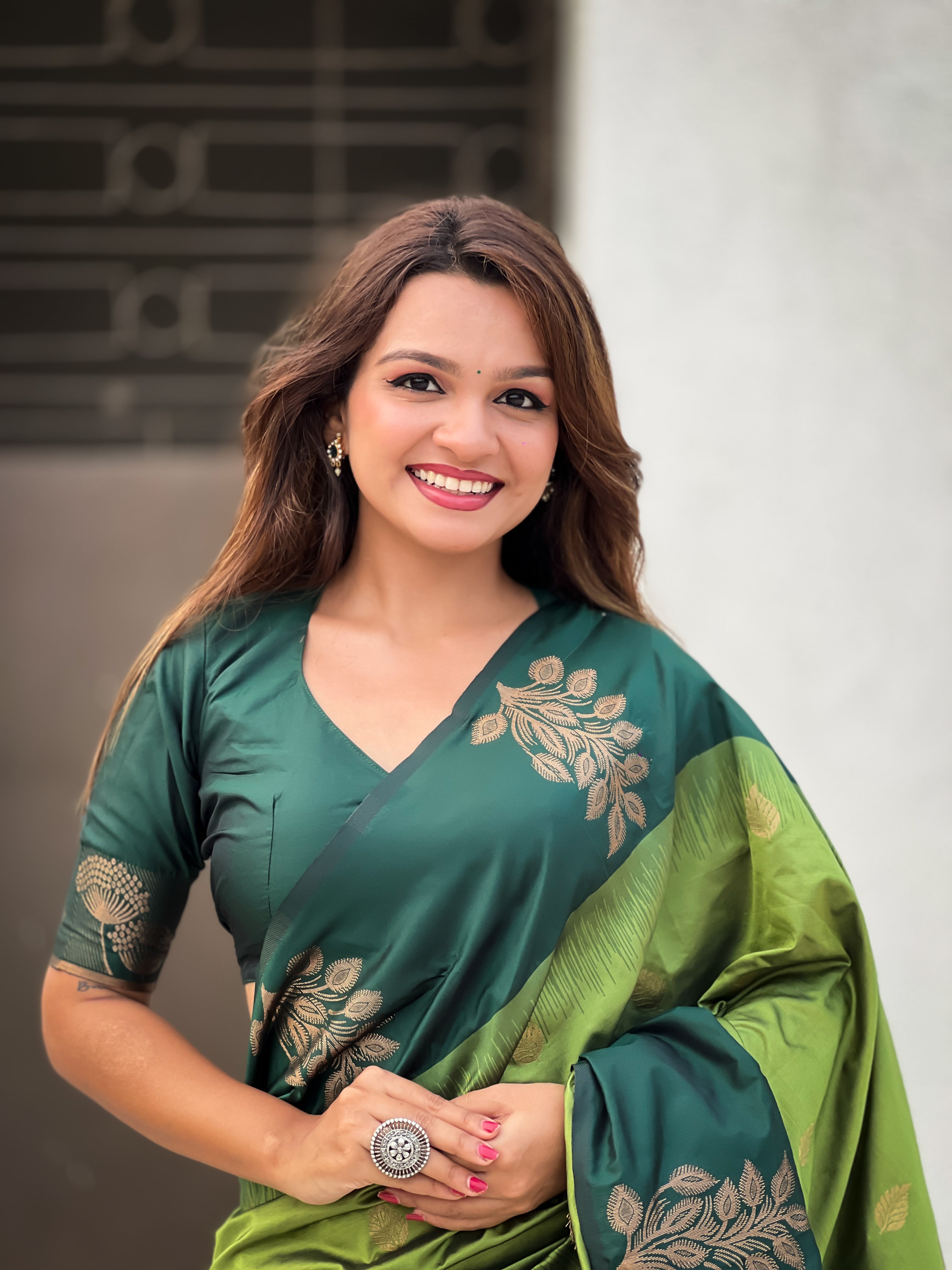 Iguana Green Soft Silk Floral Border Contrast Zari Woven Saree