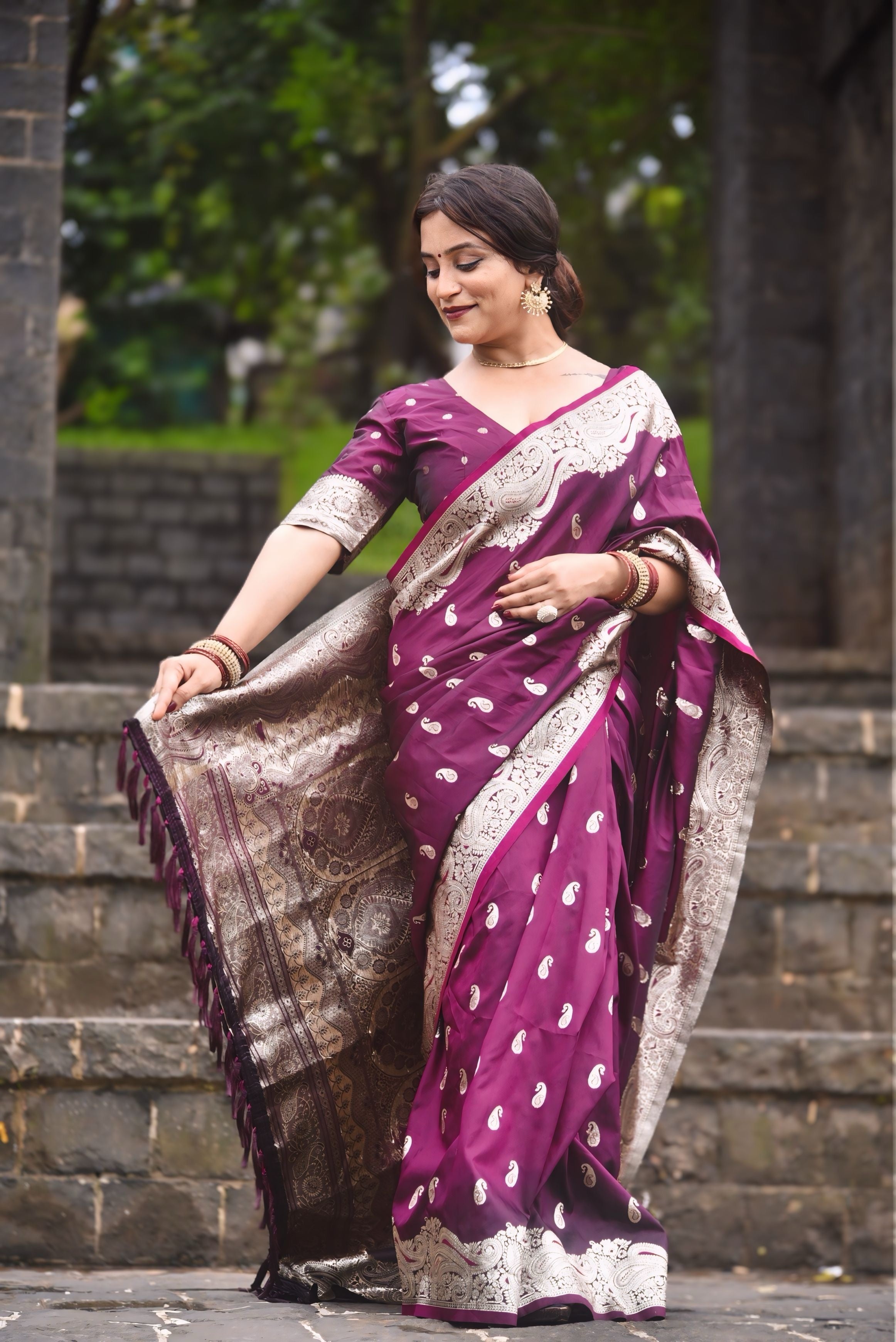Kajal in our Wine Banarasi Soft Silk Silver Zari Woven Saree