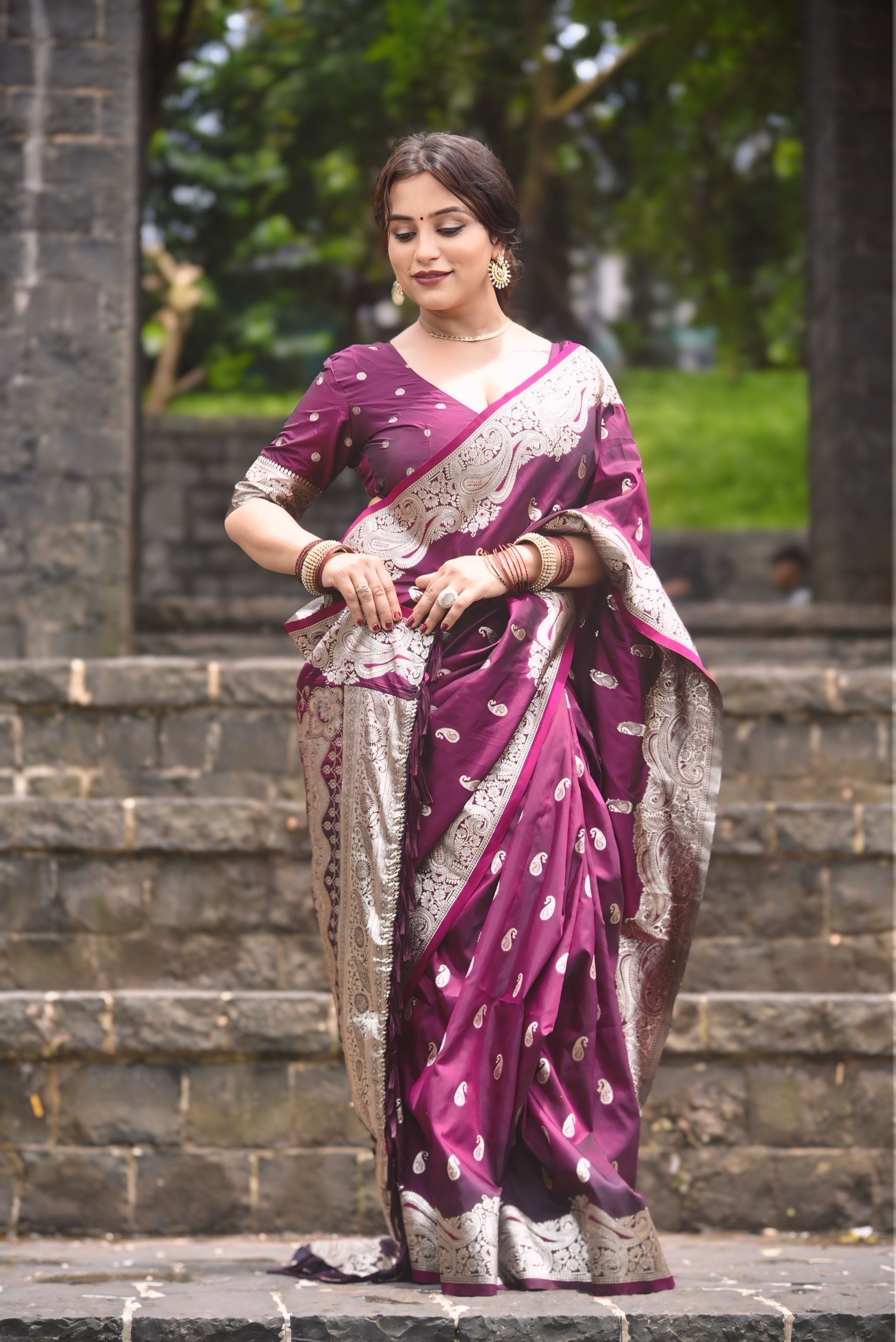 Kajal in our Wine Banarasi Soft Silk Silver Zari Woven Saree