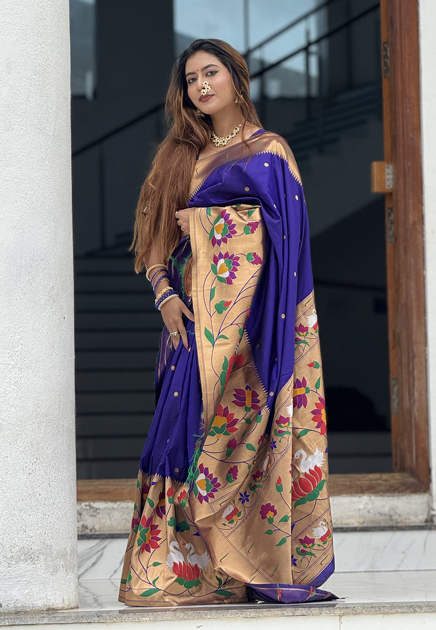 Sakshi in our Violet Paithani Silk Saree with Half Half Concept Big Border Zari Woven Saree