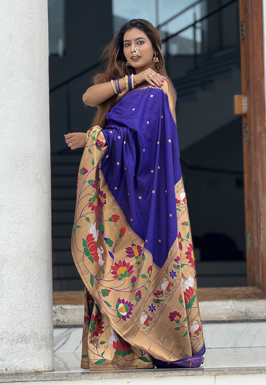 Sakshi in our Violet Paithani Silk Saree with Half Half Concept Big Border Zari Woven Saree