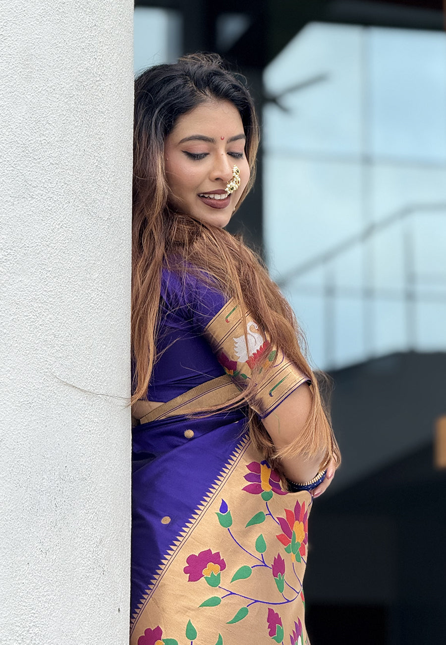 Sakshi in our Violet Paithani Silk Saree with Half Half Concept Big Border Zari Woven Saree