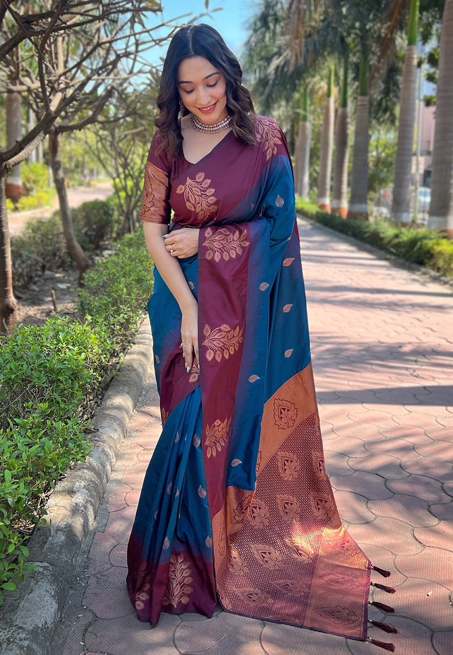 Peacock Blue Soft Silk Floral Border Contrast Zari Woven Saree