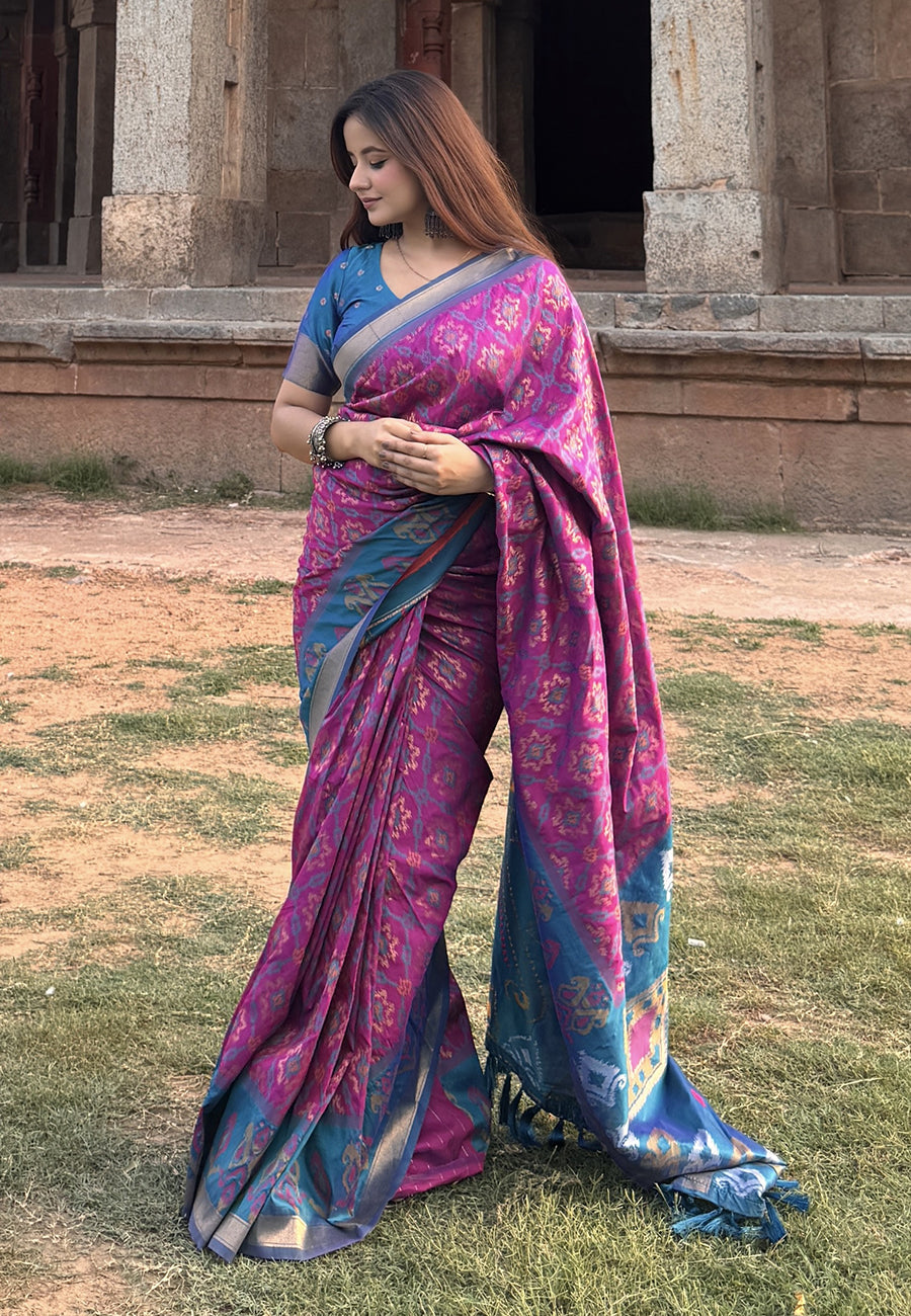 Himanshi in our Wine Soft Silk Zari Woven Patola Saree with Contrast Weaves