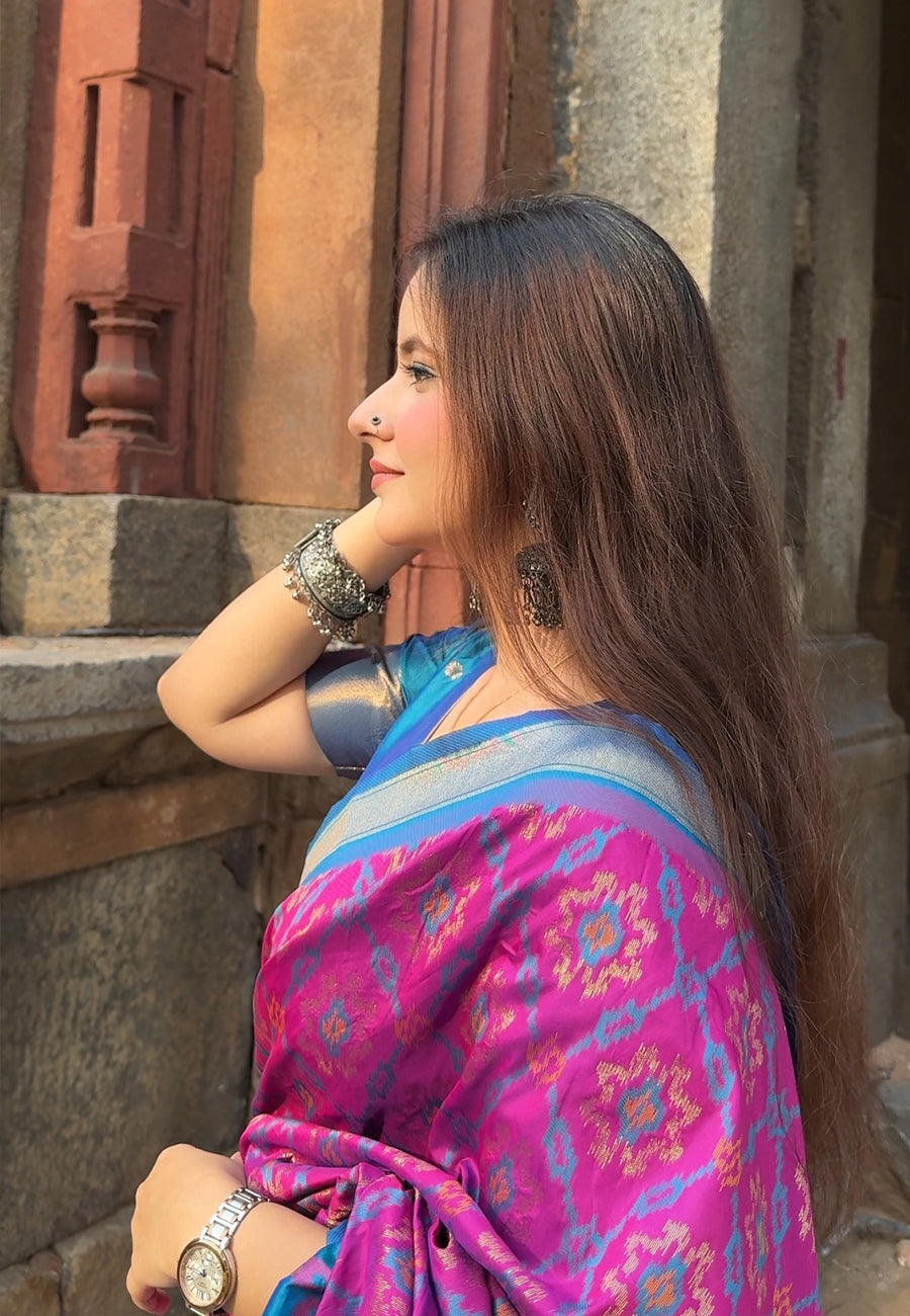 Himanshi in our Wine Soft Silk Zari Woven Patola Saree with Contrast Weaves