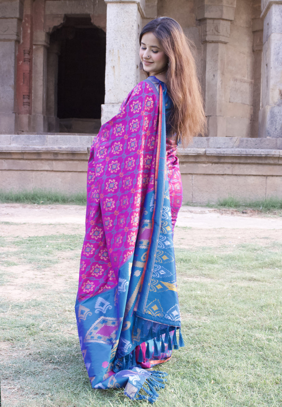 Himanshi in our Wine Soft Silk Zari Woven Patola Saree with Contrast Weaves