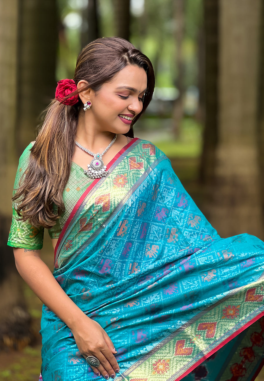 Sky Blue Soft Patola Silk Meenakari Zari Woven Saree