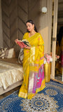 Yellow Soft Silk Ikkat Patola Saree with Meenakari Motifs Peacock Pallu and Gold Zari Border