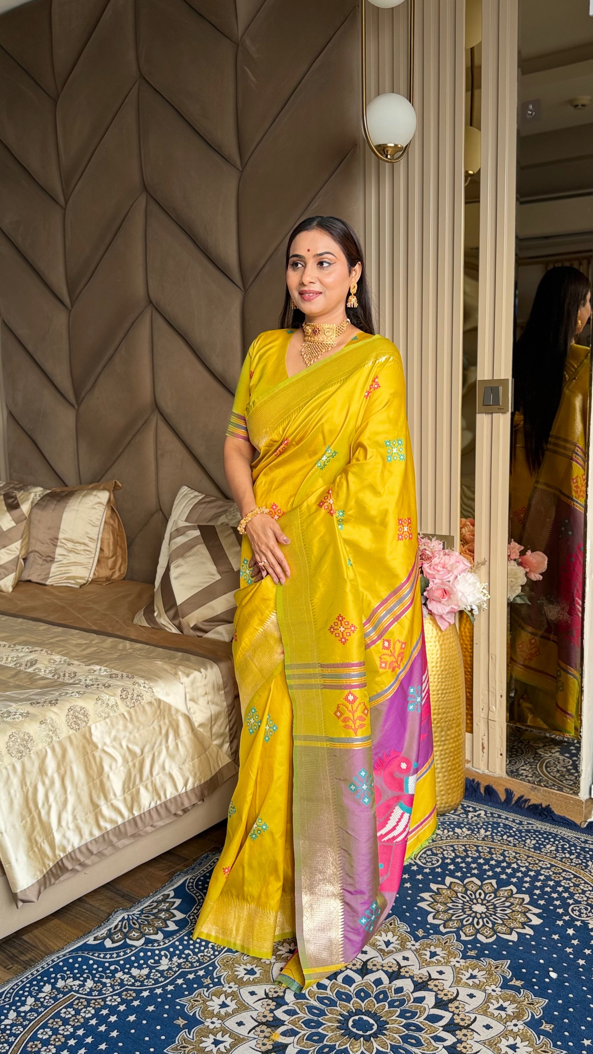 Yellow Soft Silk Ikkat Patola Saree with Meenakari Motifs Peacock Pallu and Gold Zari Border