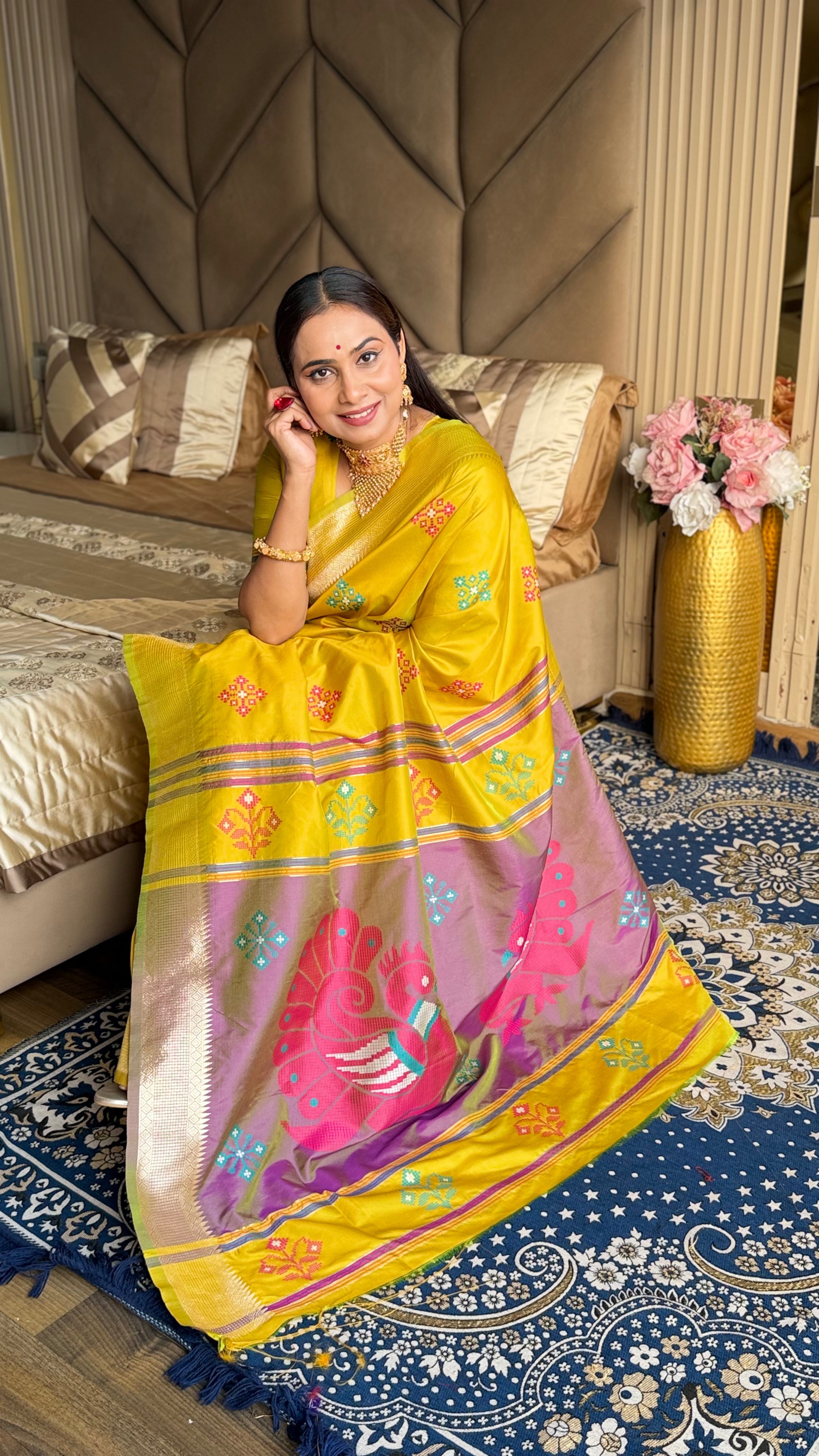 Yellow Soft Silk Ikkat Patola Saree with Meenakari Motifs Peacock Pallu and Gold Zari Border