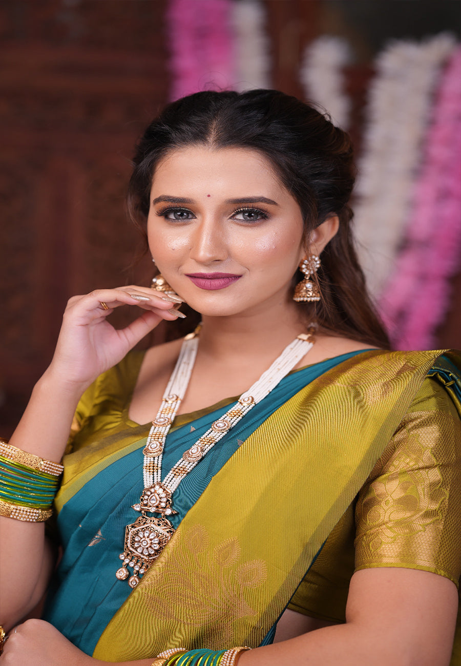 Sea Blue Soft Silk Floral Border Contrast Zari Woven Saree