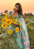 Monika in our Sea Green Chanderi Cotton Pichwai Printed Saree with Zari Woven Border